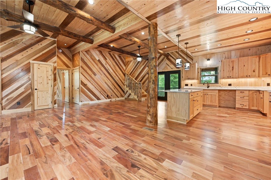 449 Hampton Ridge Road Fleetwood, NC 28626 - Photo 11 of 43 a view of a room with wooden floor