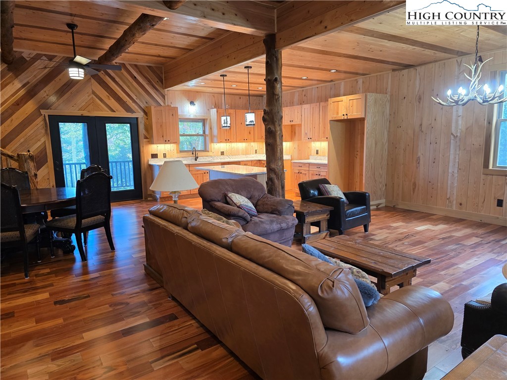 449 Hampton Ridge Road Fleetwood, NC 28626 - Photo 17 of 43 a living room with furniture and wooden floor