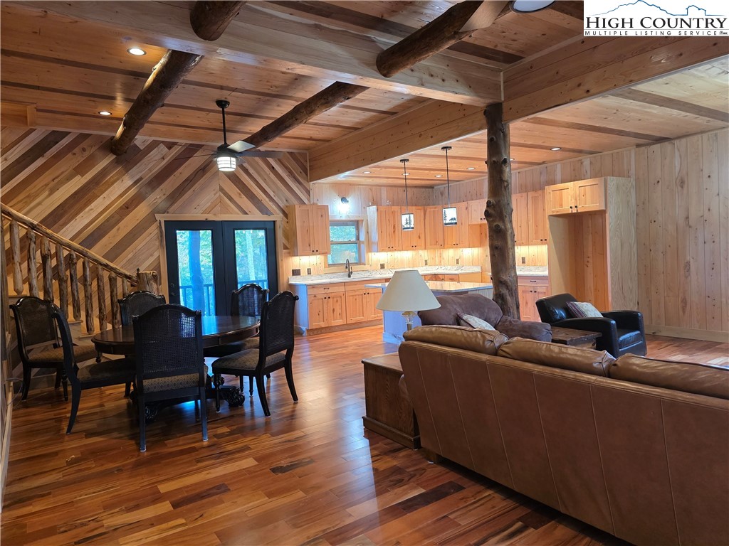 449 Hampton Ridge Road Fleetwood, NC 28626 - Photo 19 of 43 a living room with furniture and wooden floor