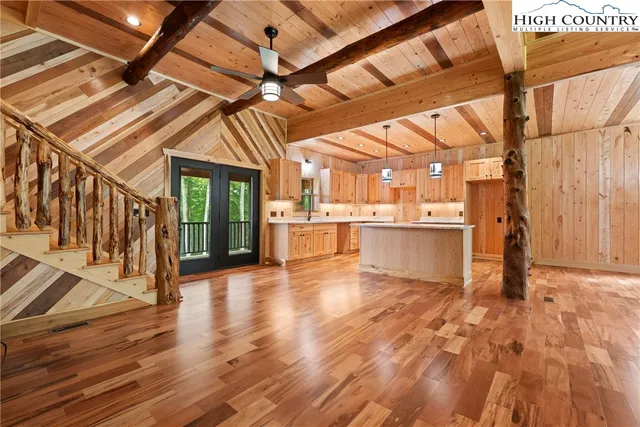 a view of a livingroom with wooden floor