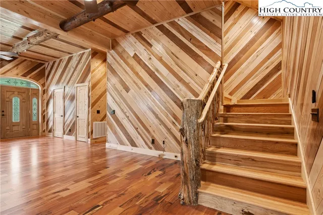 a view of entryway with wooden floor