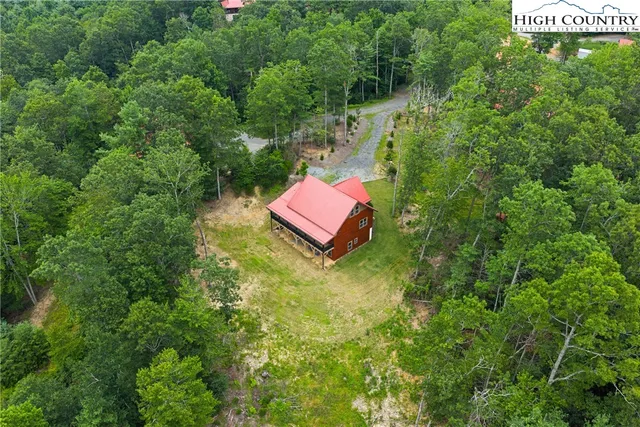 a view of a back yard of the house