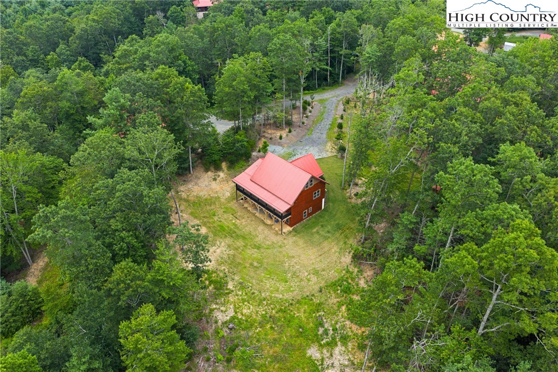 449 Hampton Ridge Road Fleetwood, NC 28626 - Photo 40 of 43 a view of a back yard of the house