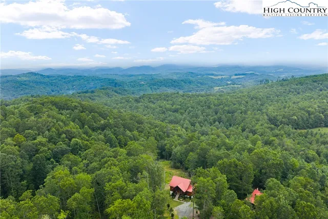 a view of a house with a street