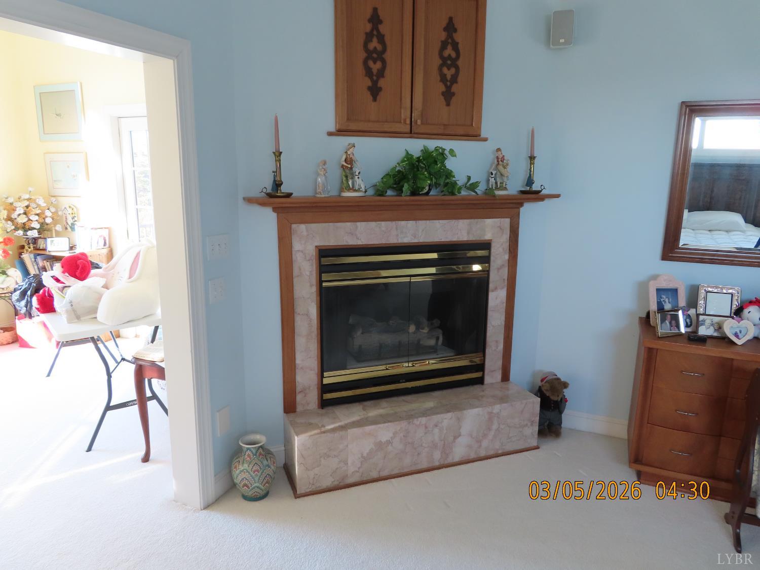6485 Falling Creek Road Bedford, VA 24523 - Photo 33 of 50 a living room with furniture and a fireplace