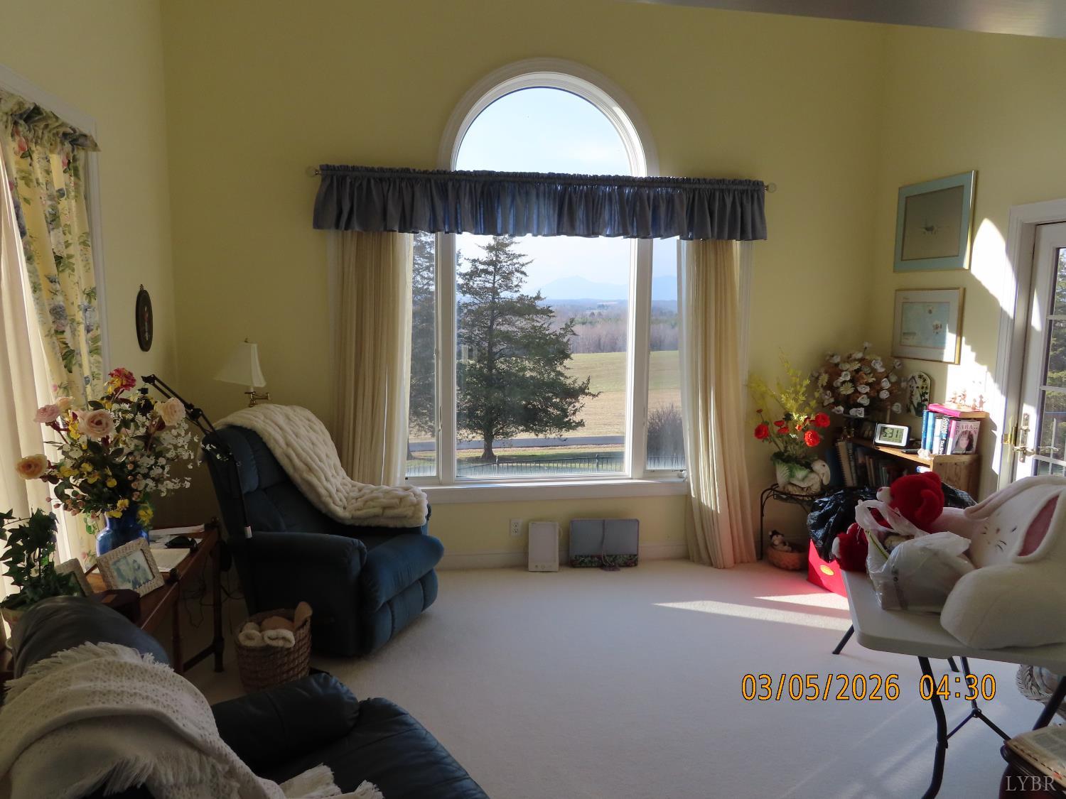 6485 Falling Creek Road Bedford, VA 24523 - Photo 34 of 50 a living room with furniture and a large window