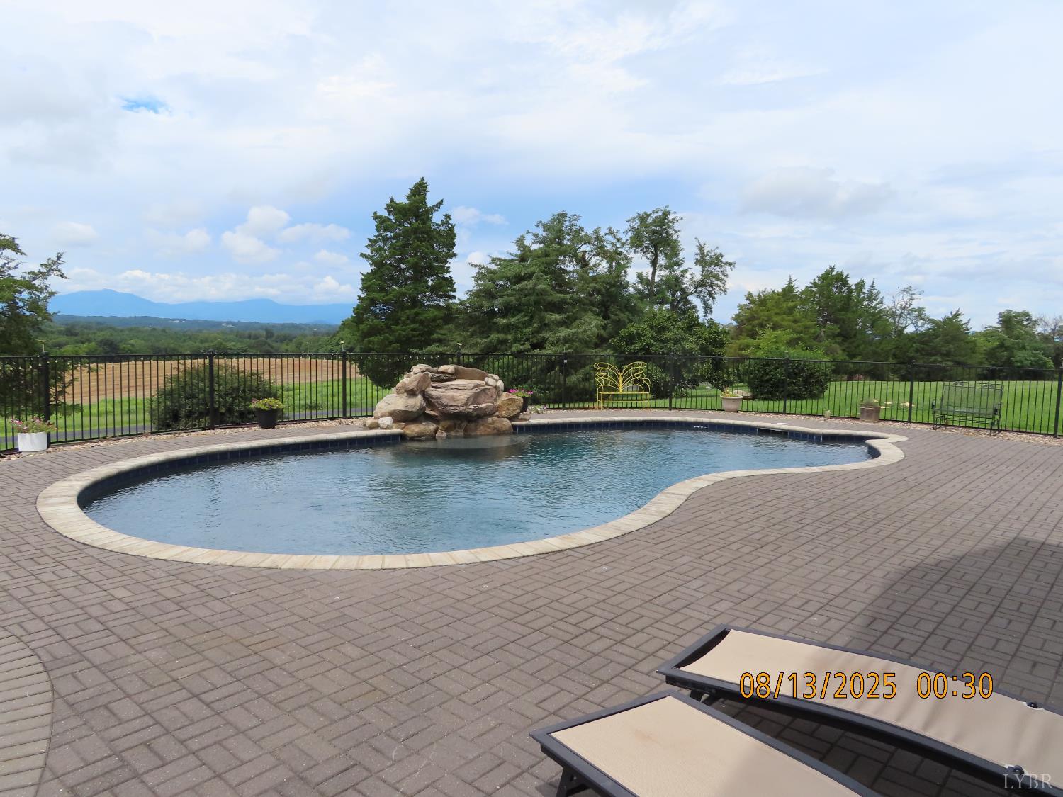 6485 Falling Creek Road Bedford, VA 24523 - Photo 5 of 50 a view of a swimming pool and trees in the background