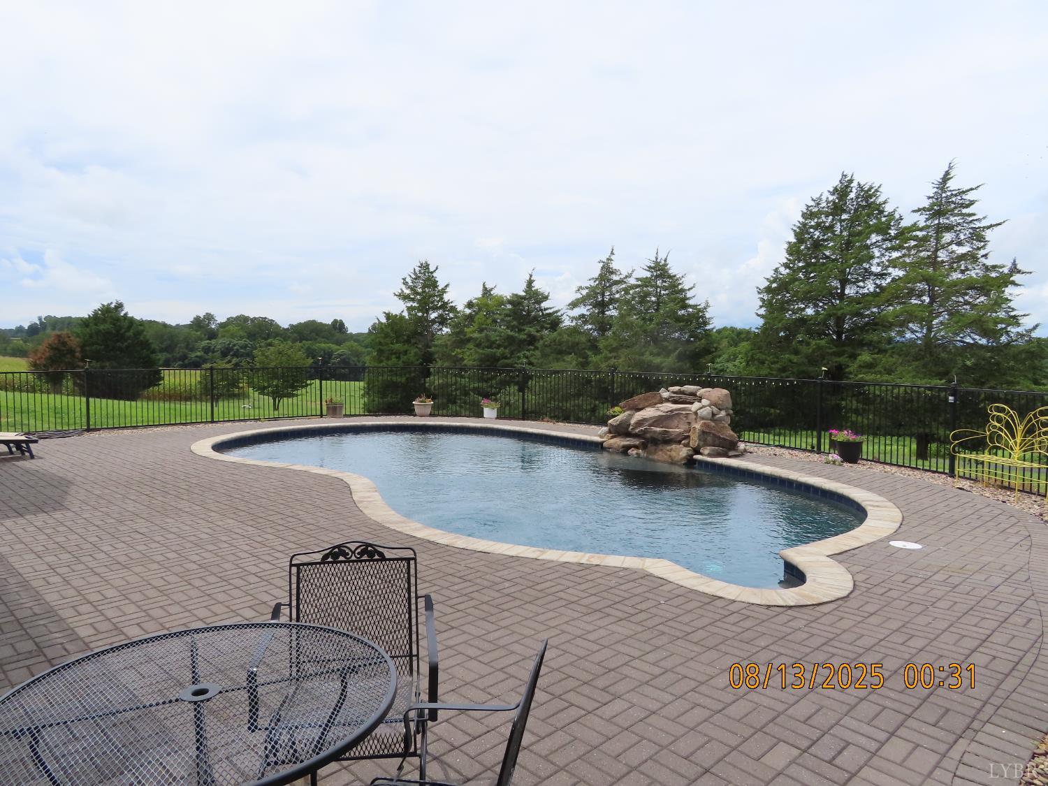 6485 Falling Creek Road Bedford, VA 24523 - Photo 6 of 50 a view of a swimming pool with a yard
