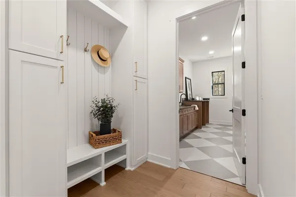 a spacious bathroom with a double vanity sink and a mirror