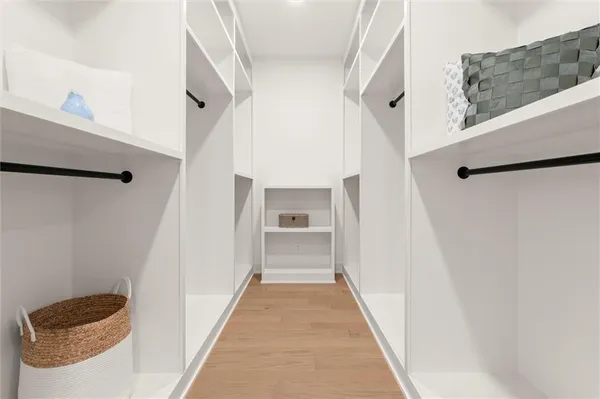 an empty room with a empty space and a ceiling fan