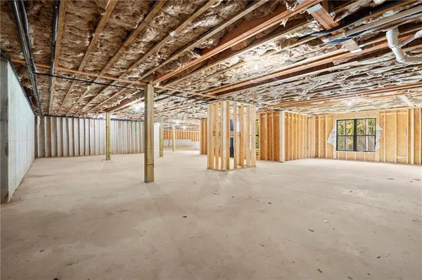 an aerial view of residential house with green space