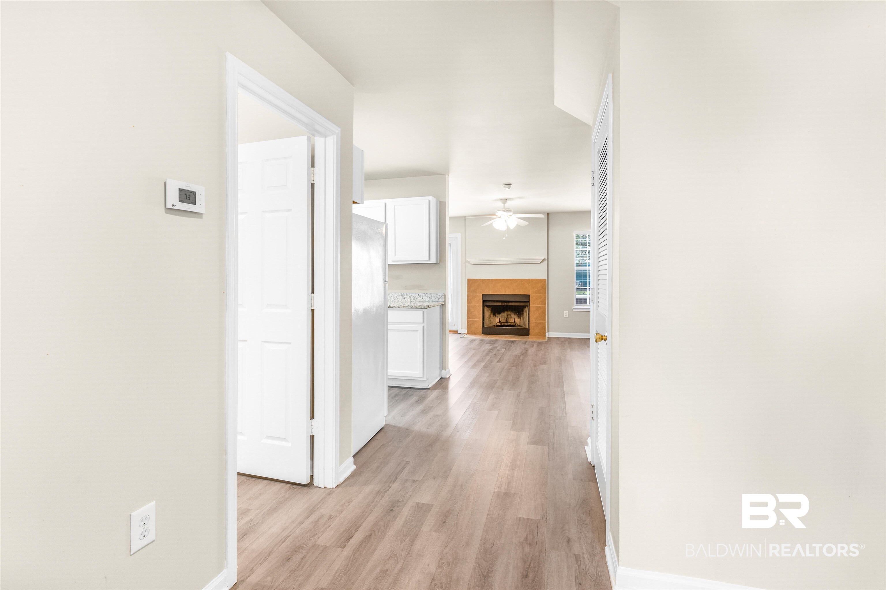 1517 Regency Road, Unit 85 Gulf Shores, AL 36542 - Photo 7 of 32 Hall with light hardwood / wood-style flooring