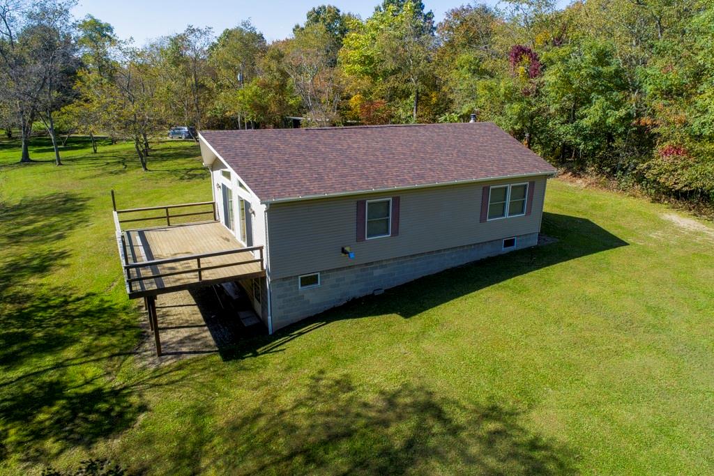 529 Upper Service Road Hookstown, PA 15050 - Photo 3 of 22 a backyard of a house with yard and outdoor seating