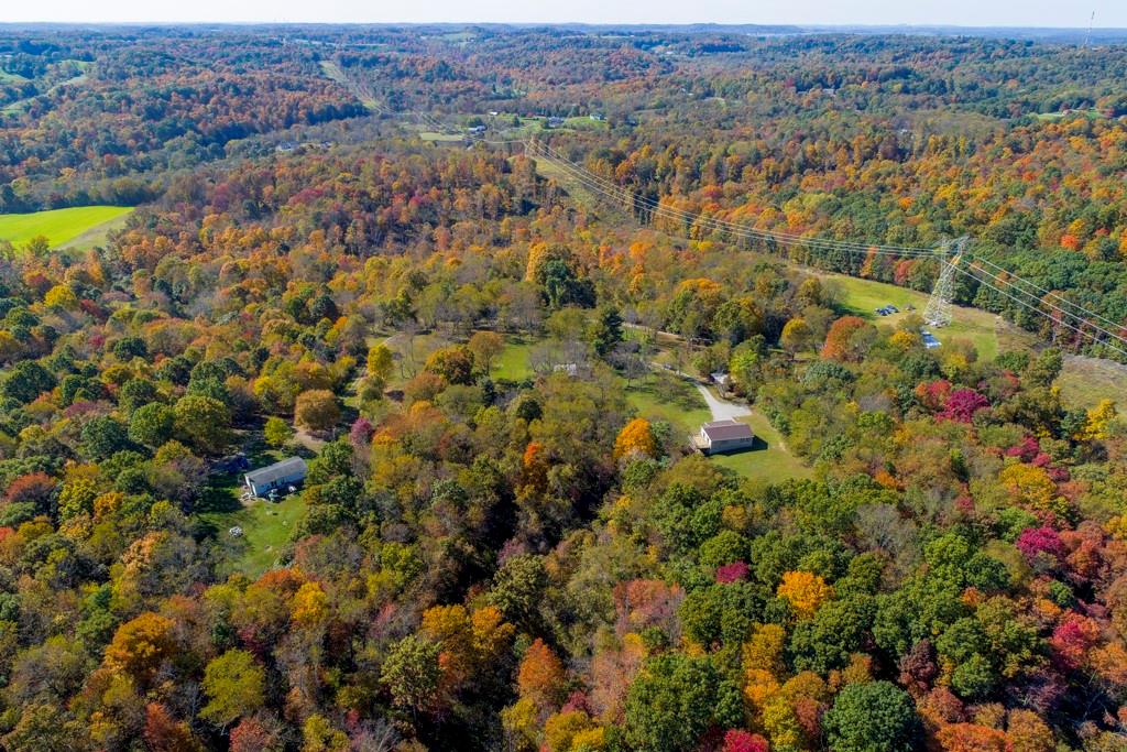 529 Upper Service Road Hookstown, PA 15050 - Photo 7 of 22 an aerial view of a houses with a lush green hillside