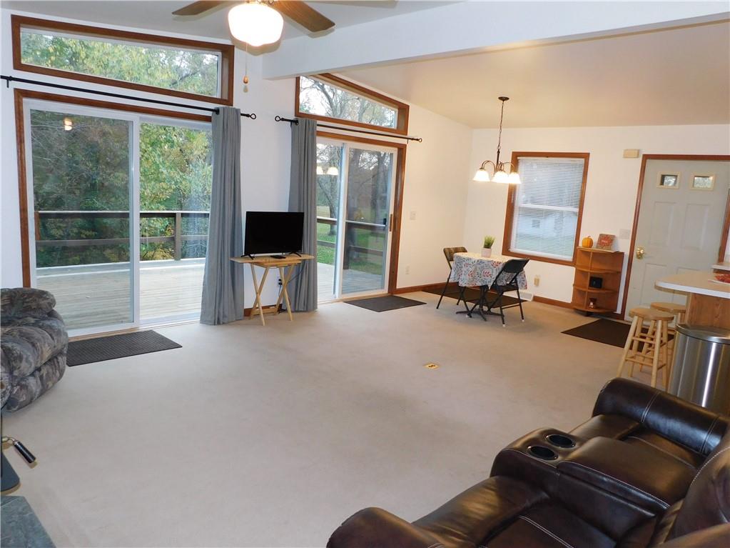 529 Upper Service Road Hookstown, PA 15050 - Photo 9 of 22 a living room with furniture gym equipment and a large window