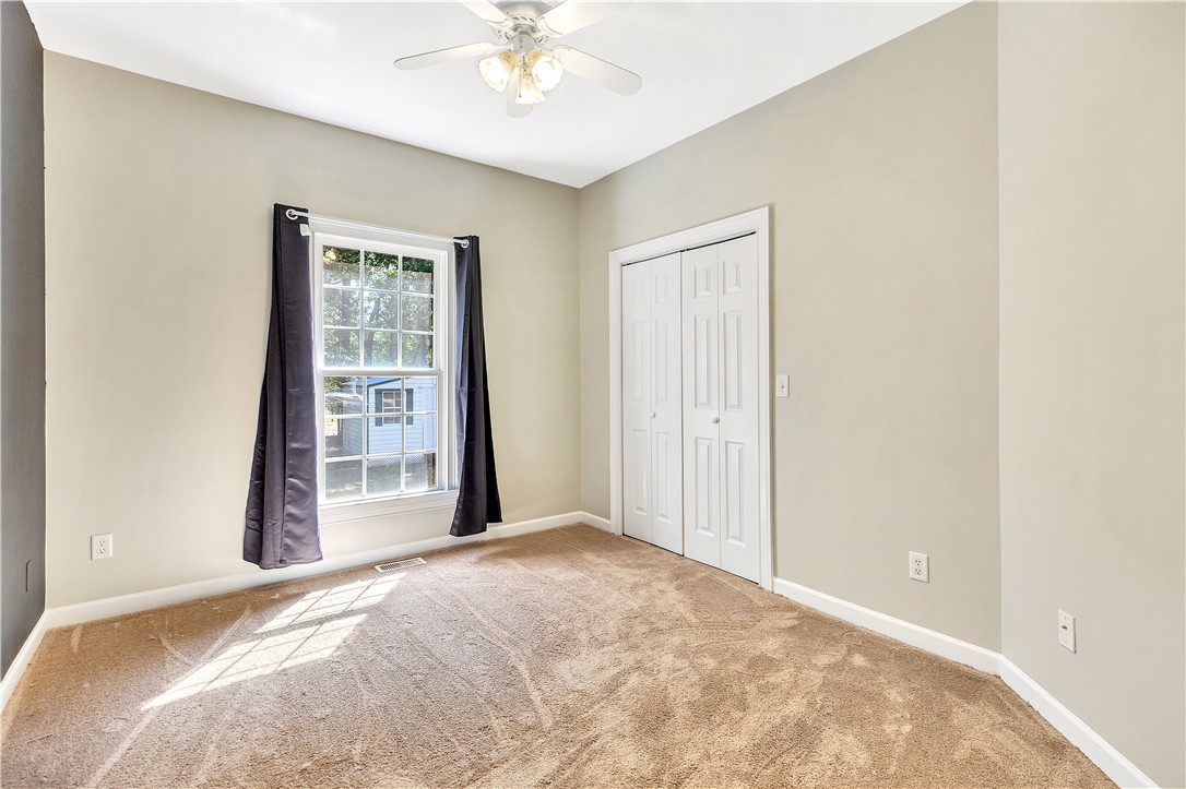 3620 Centerville Road Anderson, SC 29625 - Photo 40 of 49 Plentiful natural light streams across the carpeted floor of this comfortable secondary bedroom.