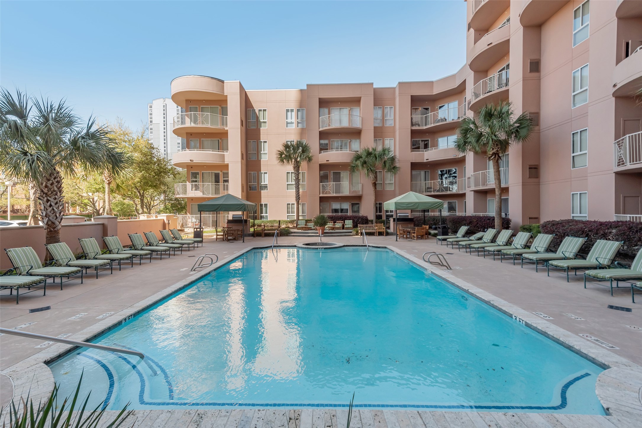 3505 Sage Road, Unit 2210 Houston, TX 77056 - Photo 36 of 40 Enjoy summer mornings and afternoons poolside.