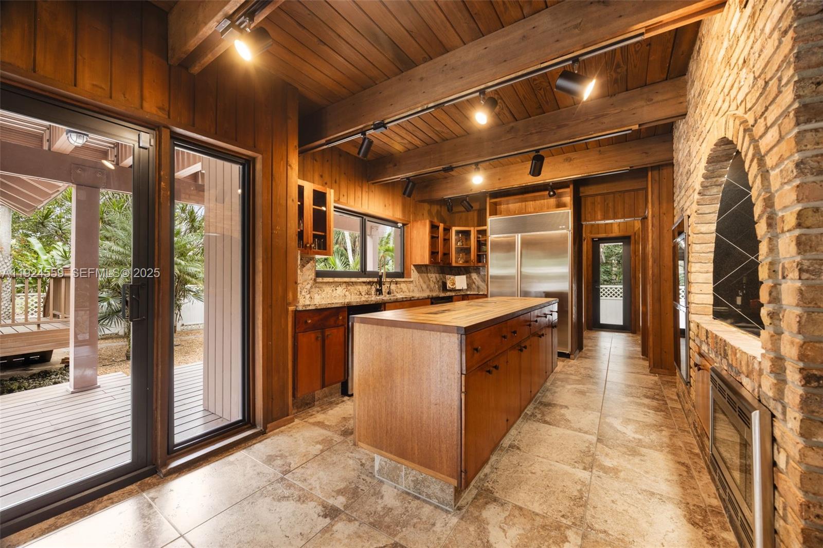 21675 Southwest 232nd Street Miami, FL 33170 - Photo 13 of 82 a large kitchen with stainless steel appliances granite countertop a refrigerator and a sink