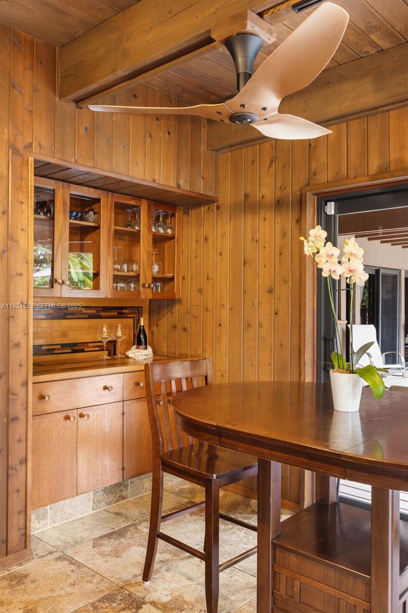 21675 Southwest 232nd Street Miami, FL 33170 - Photo 21 of 82 a kitchen that has a table and chairs in it