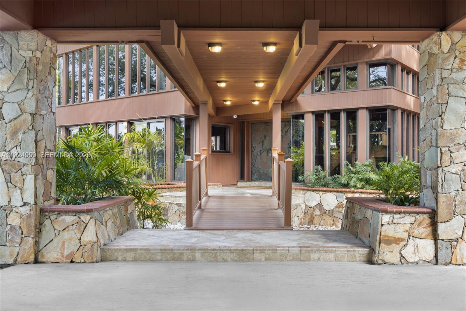 21675 Southwest 232nd Street Miami, FL 33170 - Photo 3 of 82 front view of a house with a porch