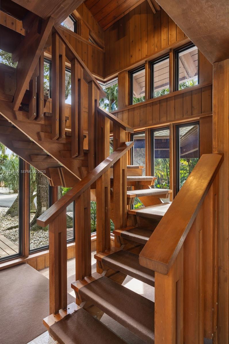 21675 Southwest 232nd Street Miami, FL 33170 - Photo 32 of 82 a view of building with wooden stairs and a stairs