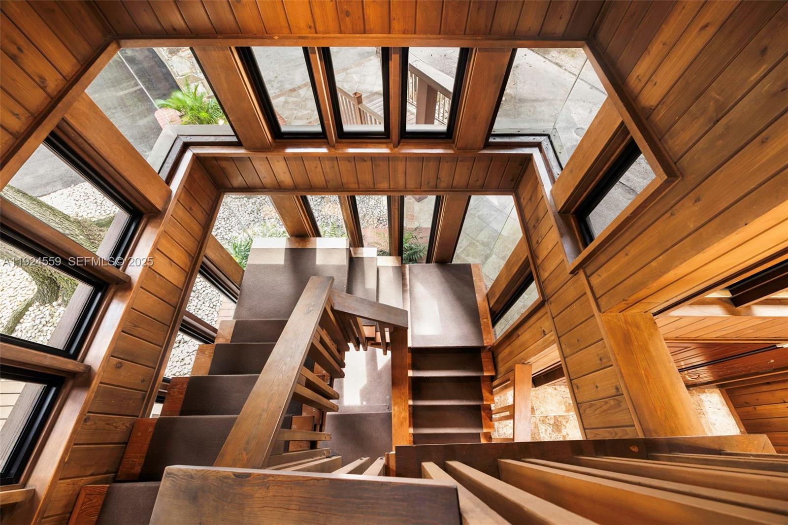 21675 Southwest 232nd Street Miami, FL 33170 - Photo 34 of 82 a view of staircase with a rug