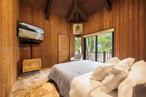 a view of balcony and floor to ceiling window