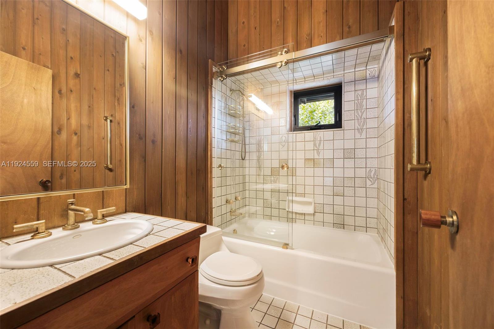 21675 Southwest 232nd Street Miami, FL 33170 - Photo 54 of 82 a bathroom with a granite countertop sink toilet and shower