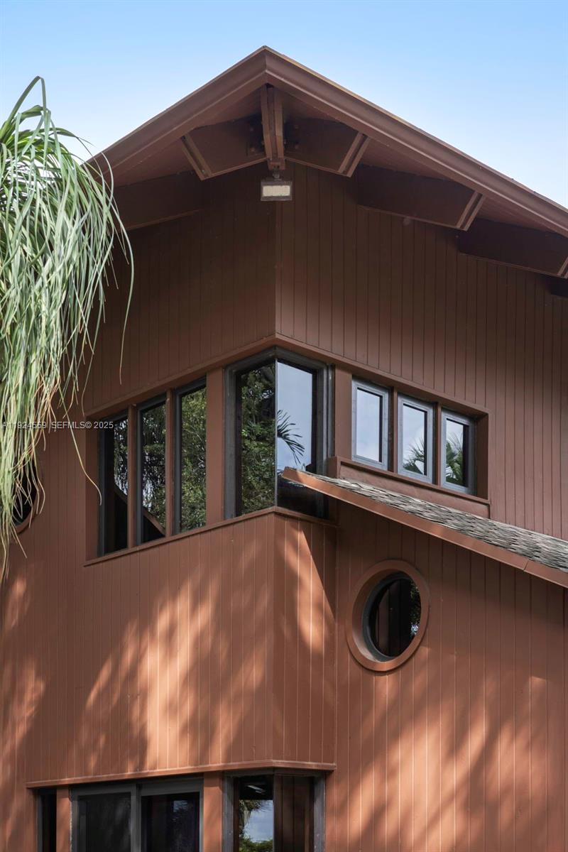 21675 Southwest 232nd Street Miami, FL 33170 - Photo 71 of 82 a view of a house with a balcony