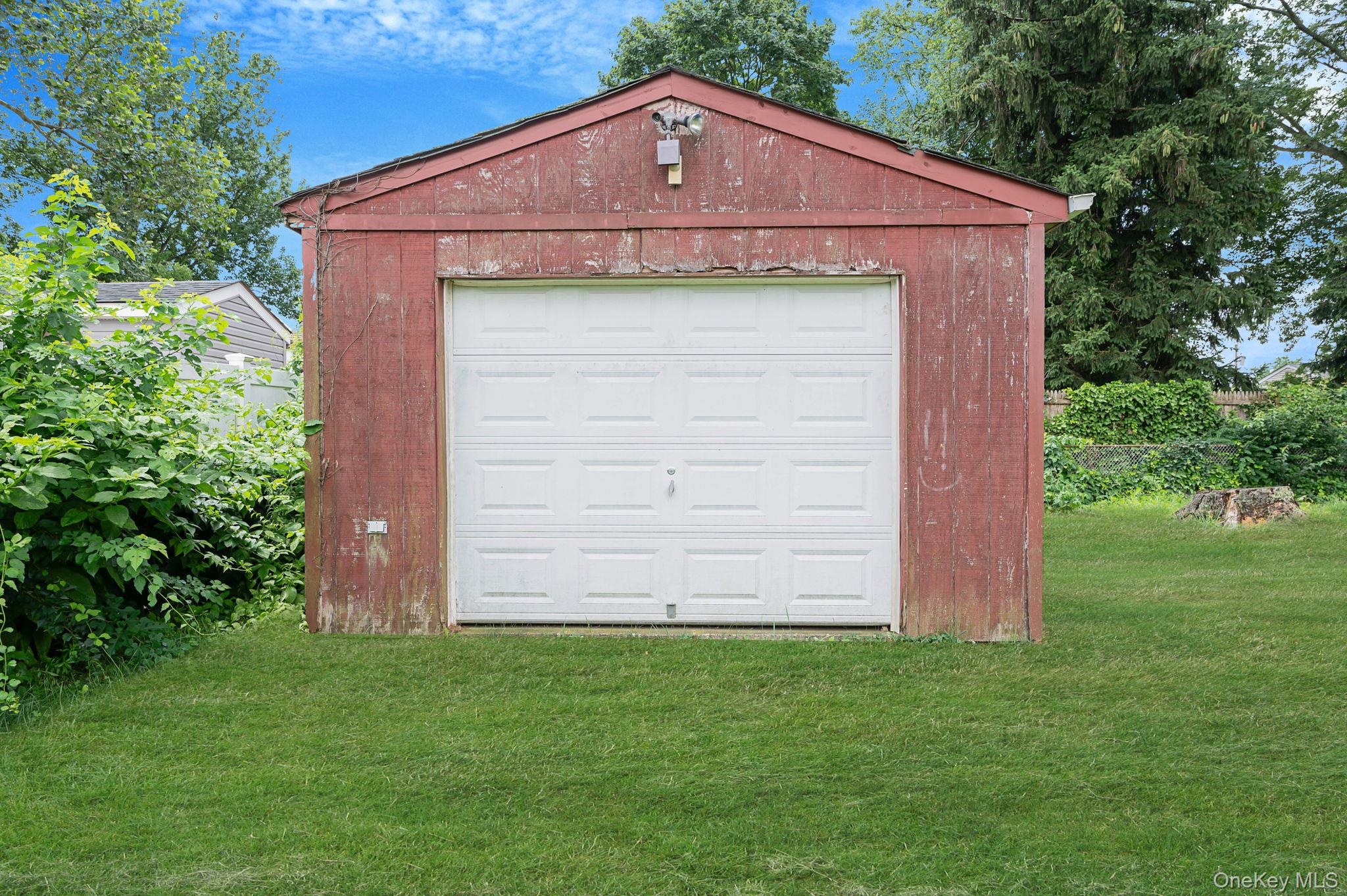 10 Laurie Road Brentwood, NY 11717 - Photo 29 of 29 View of garage