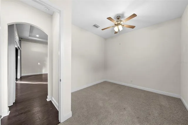 a view of a backyard with sitting area