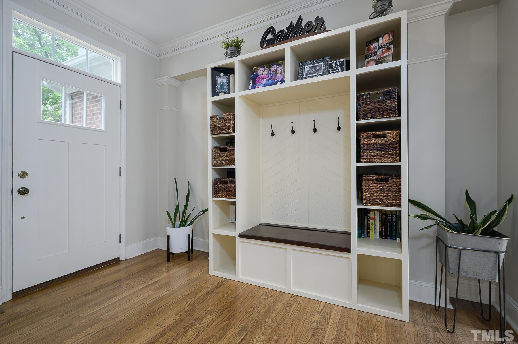 701 Modena Drive Cary, NC 27513 - Photo 4 of 39 a living room with furniture and wooden floor