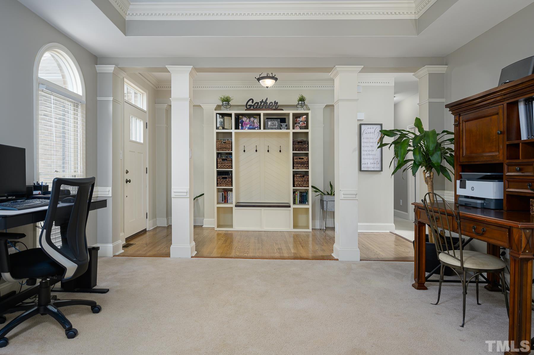 701 Modena Drive Cary, NC 27513 - Photo 7 of 39 a view of a livingroom with workspace and a window