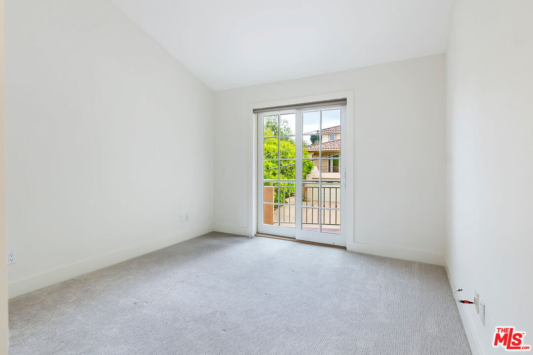 23550 Valley View Road Calabasas, CA 91302 - Photo 19 of 26 a view of an empty room with a window