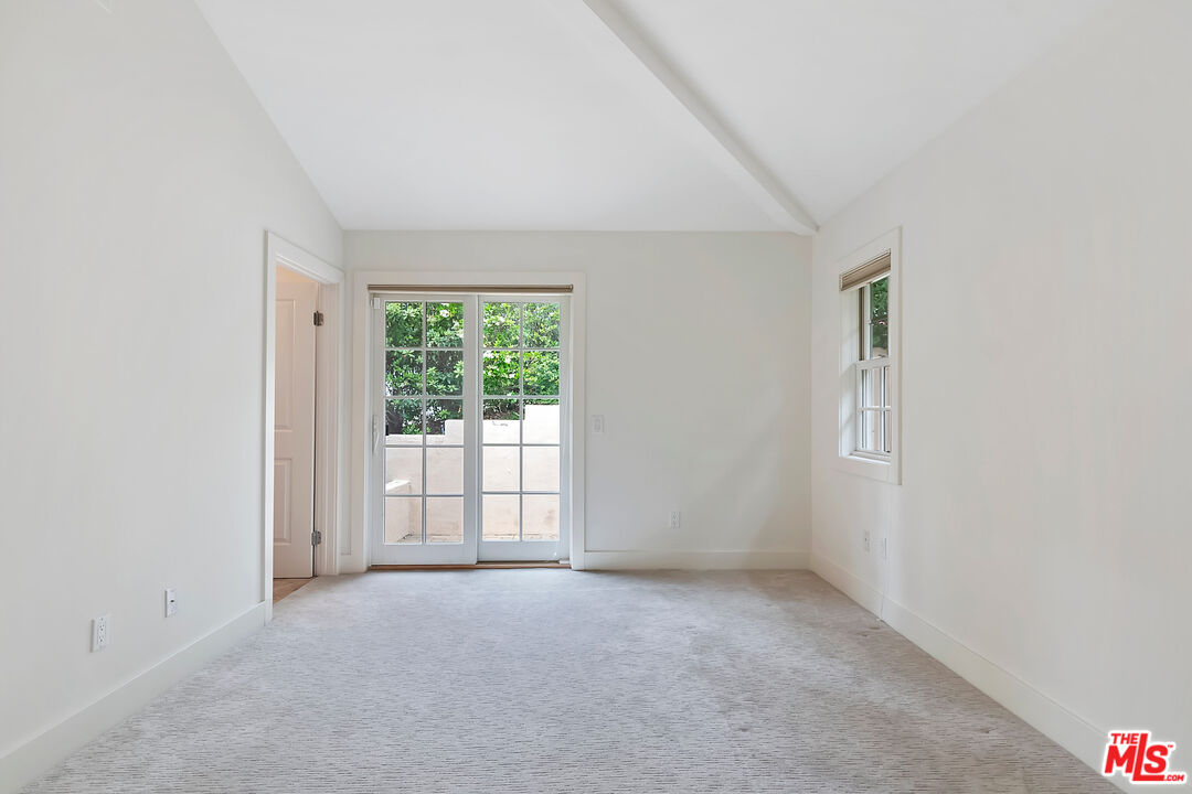 23550 Valley View Road Calabasas, CA 91302 - Photo 20 of 26 an empty room with windows