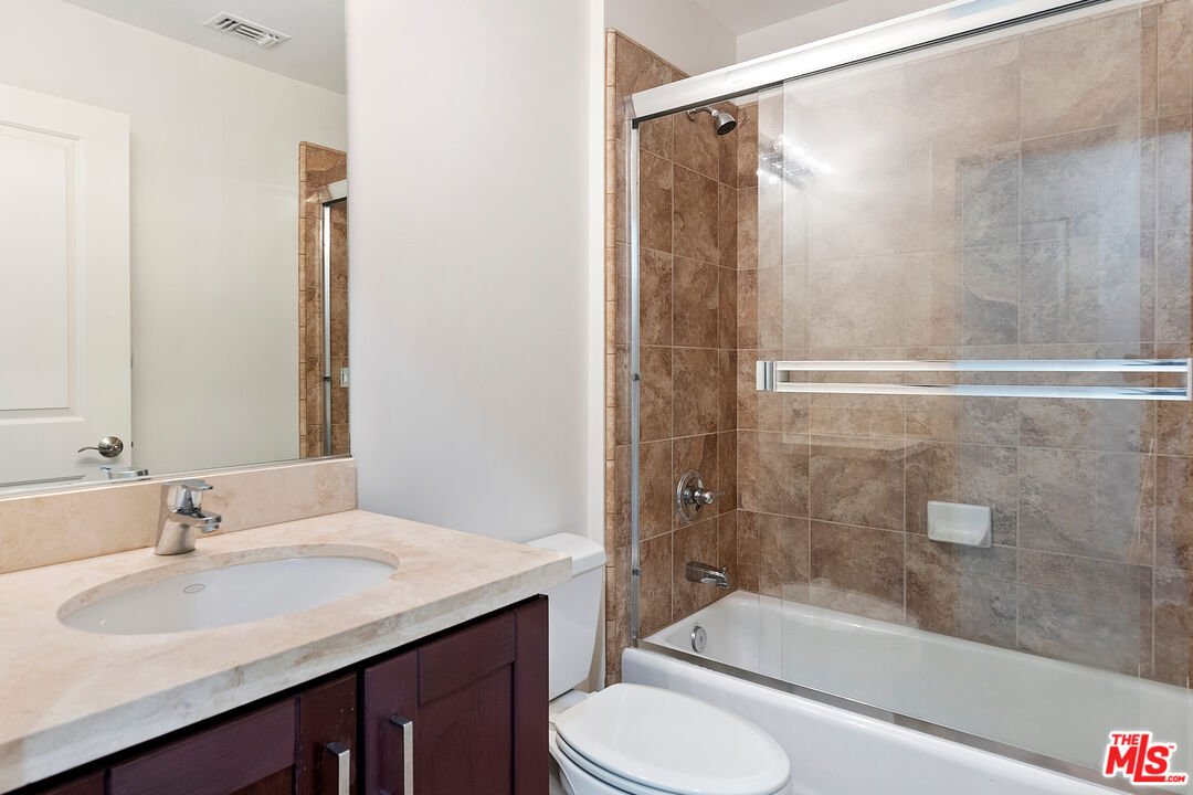 23550 Valley View Road Calabasas, CA 91302 - Photo 21 of 26 a bathroom with a sink toilet and shower
