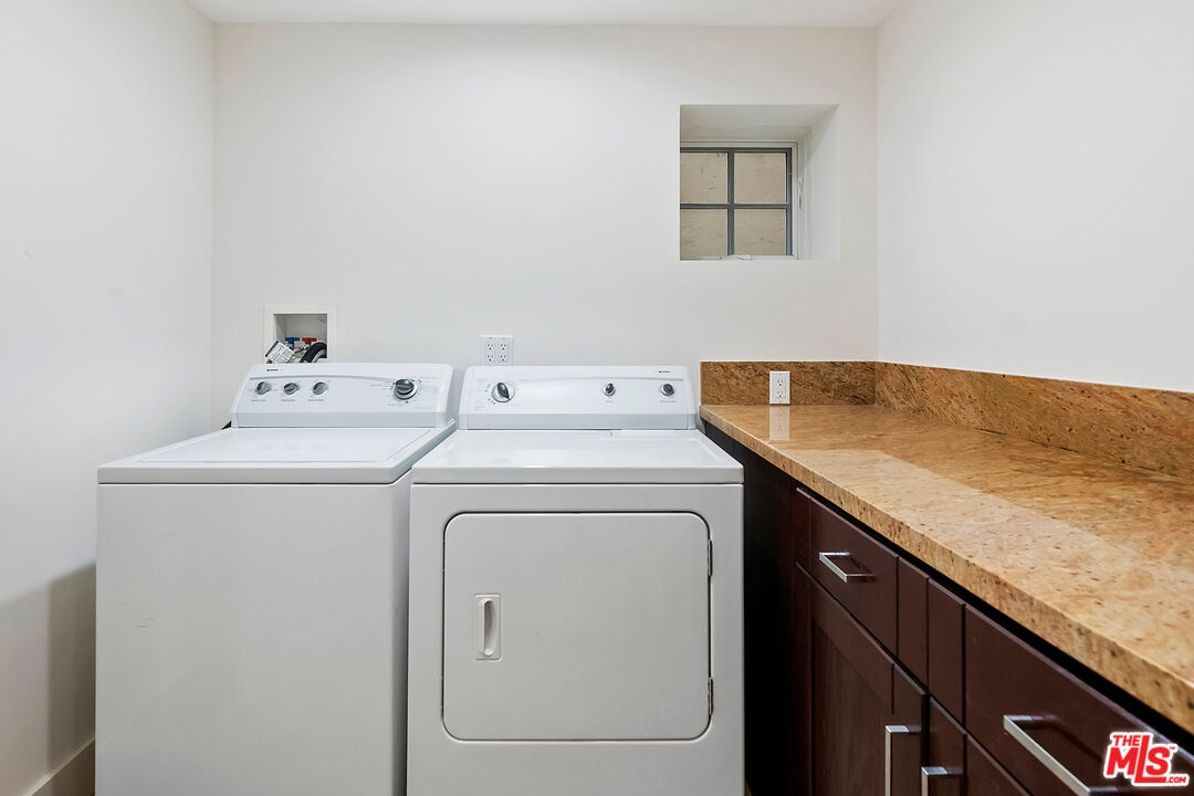 23550 Valley View Road Calabasas, CA 91302 - Photo 23 of 26 a utility room with dryer and washer