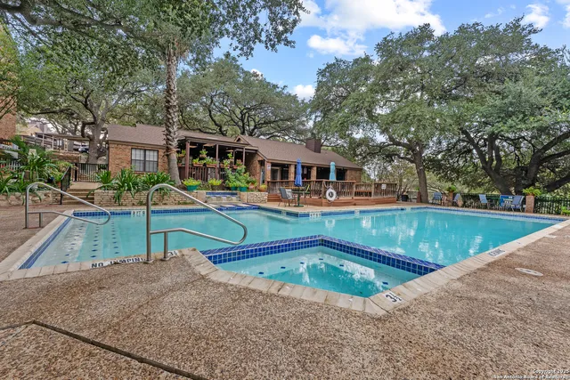 a view of backyard with green space