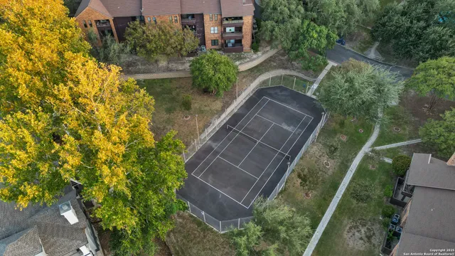a view of a street with sitting area