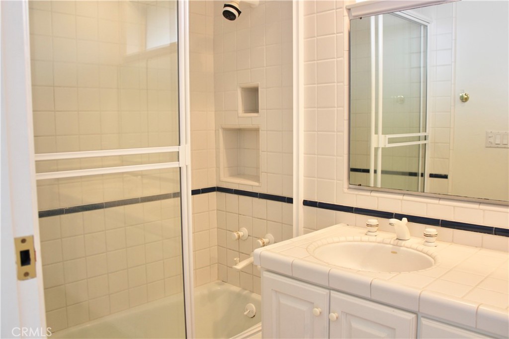 6832 Verde Ridge Road Rancho Palos Verdes, CA 90275 - Photo 17 of 21 a bathroom with a sink and a shower