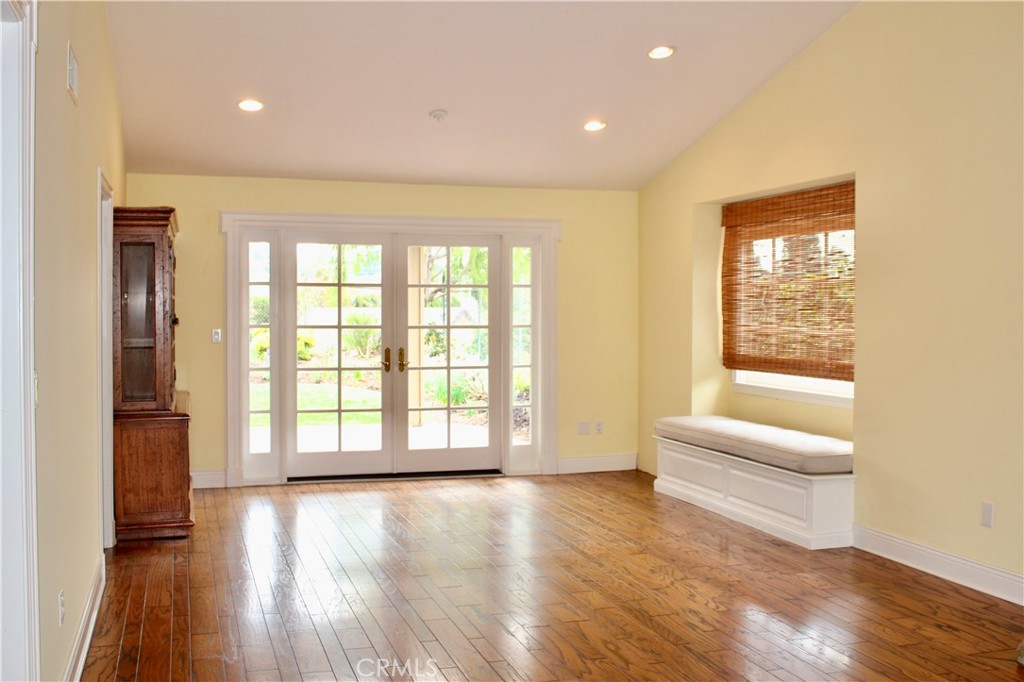 6832 Verde Ridge Road Rancho Palos Verdes, CA 90275 - Photo 3 of 21 a view of an empty room with a window and wooden floor