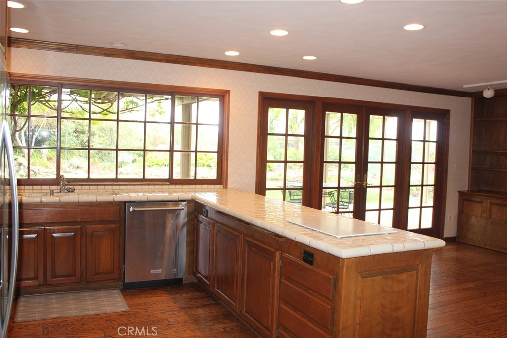 6832 Verde Ridge Road Rancho Palos Verdes, CA 90275 - Photo 5 of 21 a large kitchen with kitchen island a sink and a large window