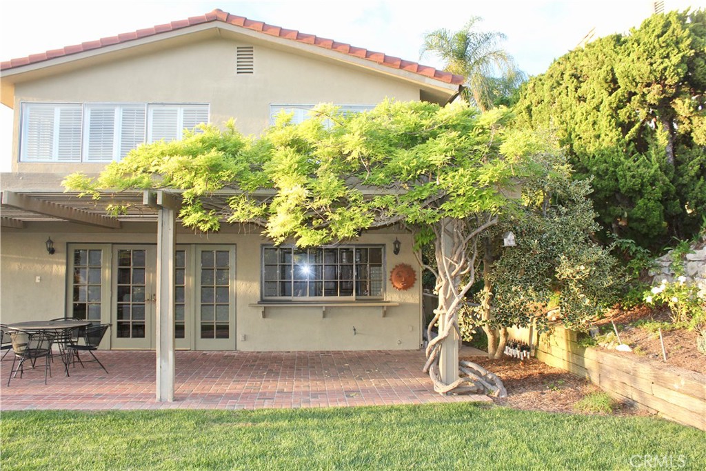 6832 Verde Ridge Road Rancho Palos Verdes, CA 90275 - Photo 10 of 21 a front view of a house with garden