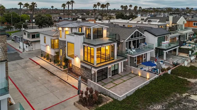 an aerial view of a house with a big yard