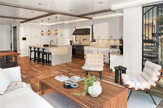 a living room with furniture and a dining table with wooden floor