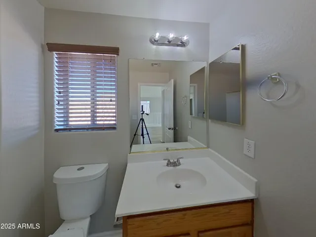 a view of a room that has a window in it