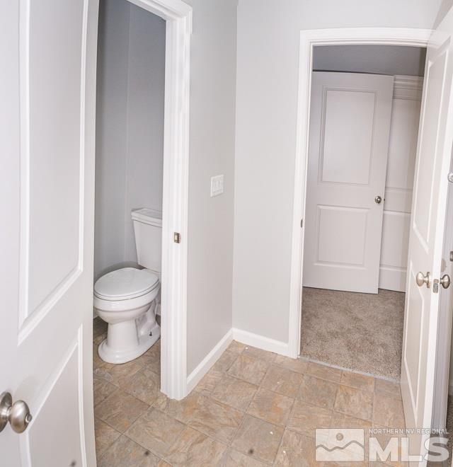 1654 Lone Oak Trail Reno, NV 89523 - Photo 17 of 22 a bathroom with a toilet