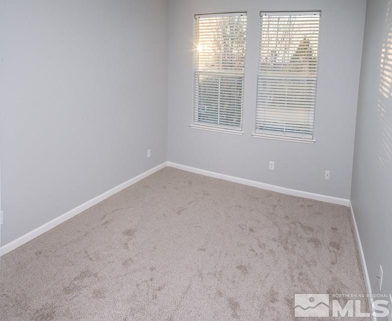 1654 Lone Oak Trail Reno, NV 89523 - Photo 8 of 22 an empty room with a window
