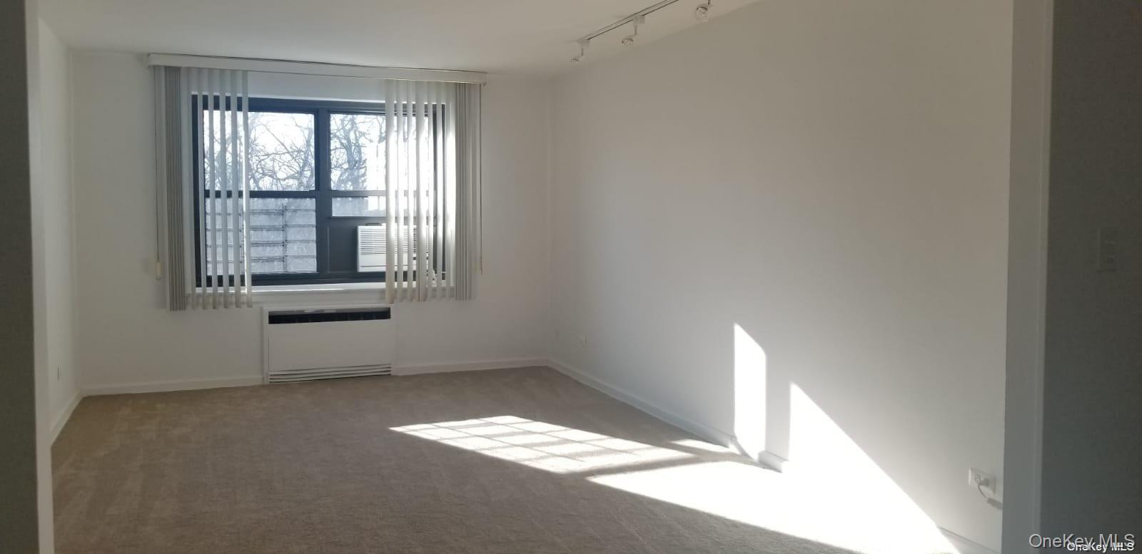 73-45 210th Street, Unit 4B Queens, NY 11364 - Photo 11 of 12 a view of room with window