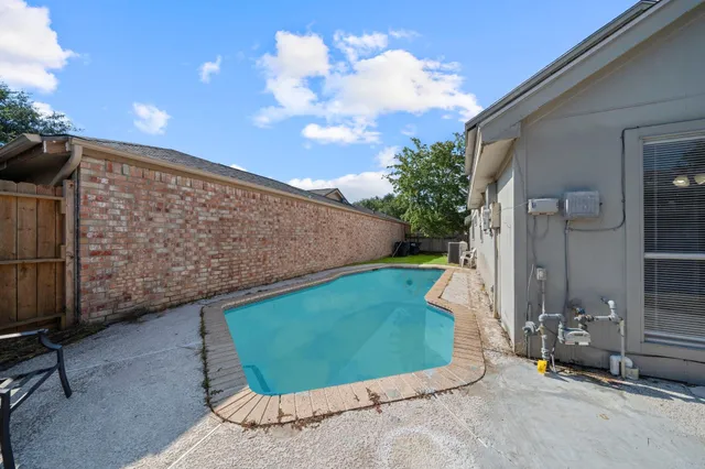 a living room with furniture fireplace and a flat screen tv